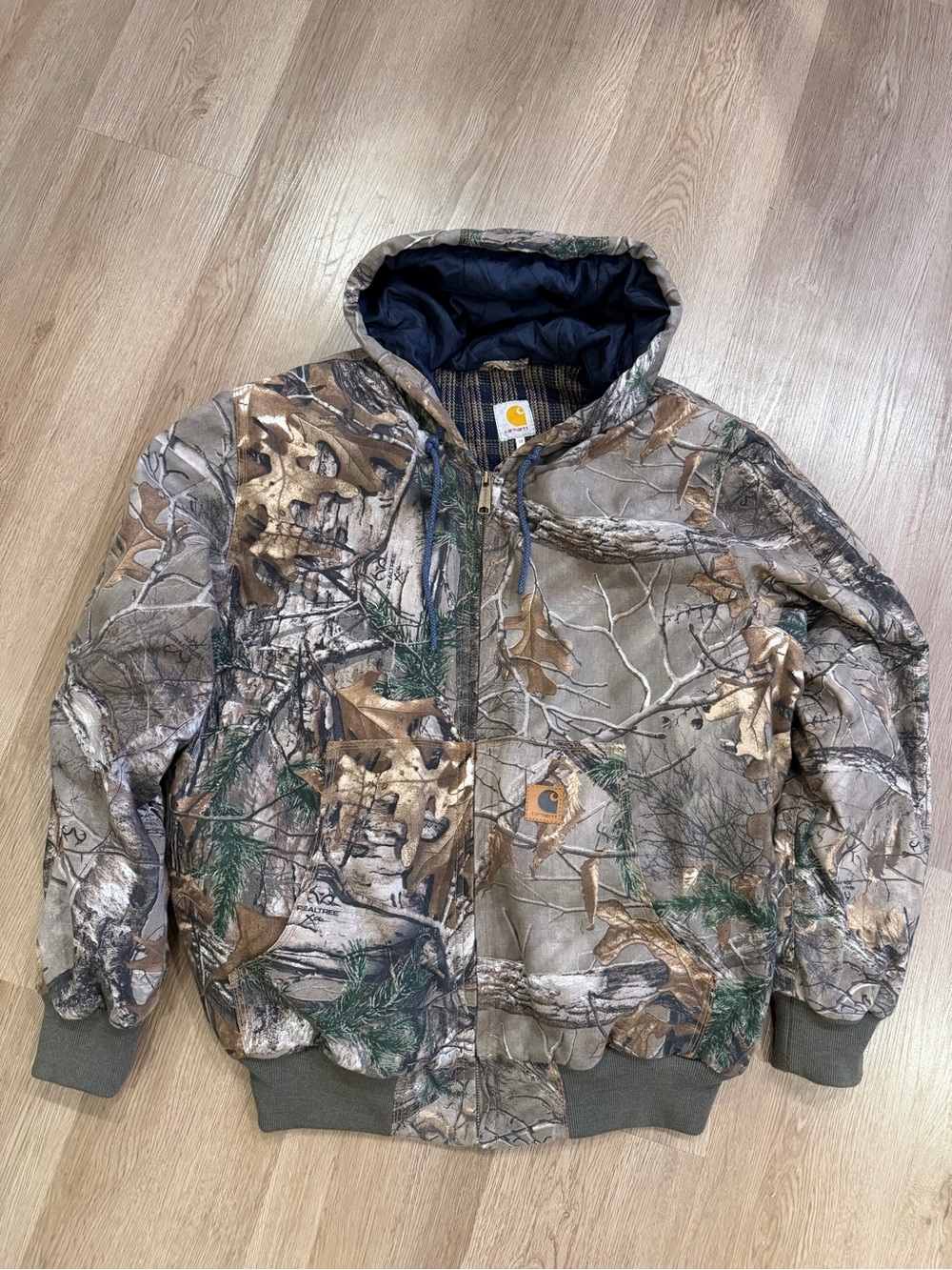 Carhartt Camo Hooded Jacket with Navy Lining and Blue Drawstrings